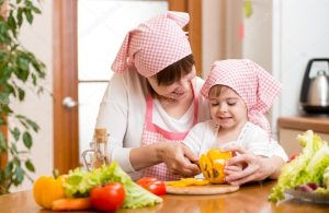depositphotos_47627861-stock-photo-mother-and-kid-girl-preparing